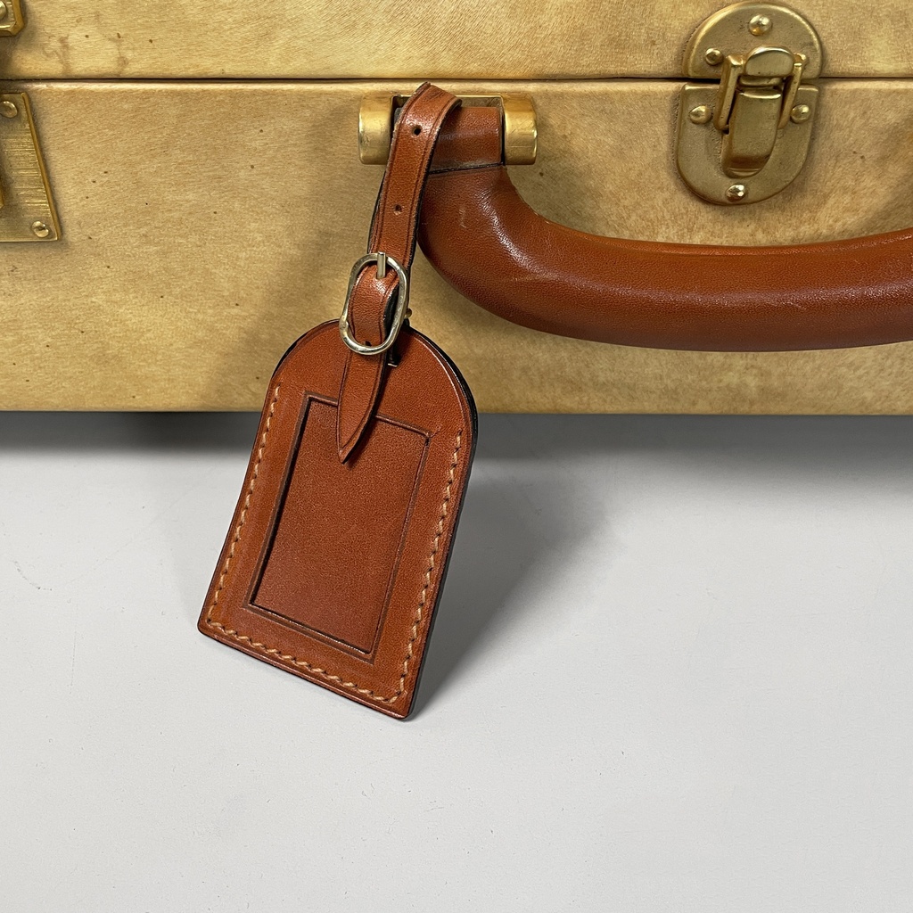 Valigia in pelle beige e marrone, 1960 ca.