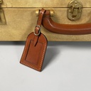 Valigia in pelle beige e marrone, 1960 ca.