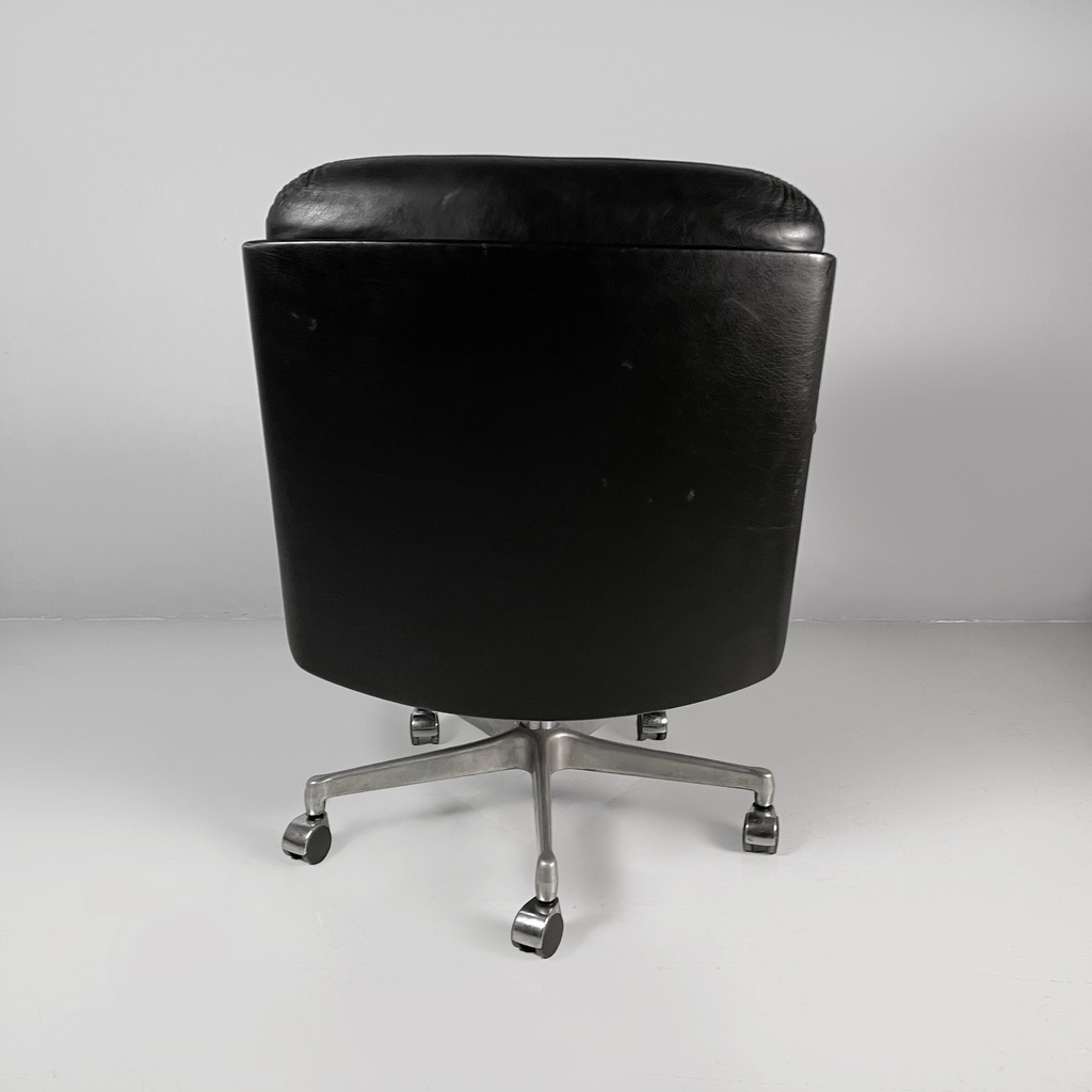 Poltrona da ufficio in pelle nera e metallo, 1980 ca.