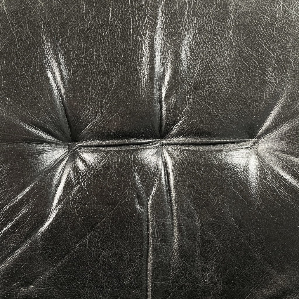 Poltrona da ufficio in pelle nera e metallo, 1980 ca.