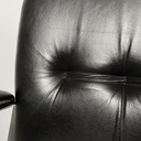 Poltrona da ufficio in pelle nera e metallo, 1980 ca.