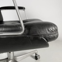 Poltrona da ufficio in pelle nera e metallo, 1980 ca.