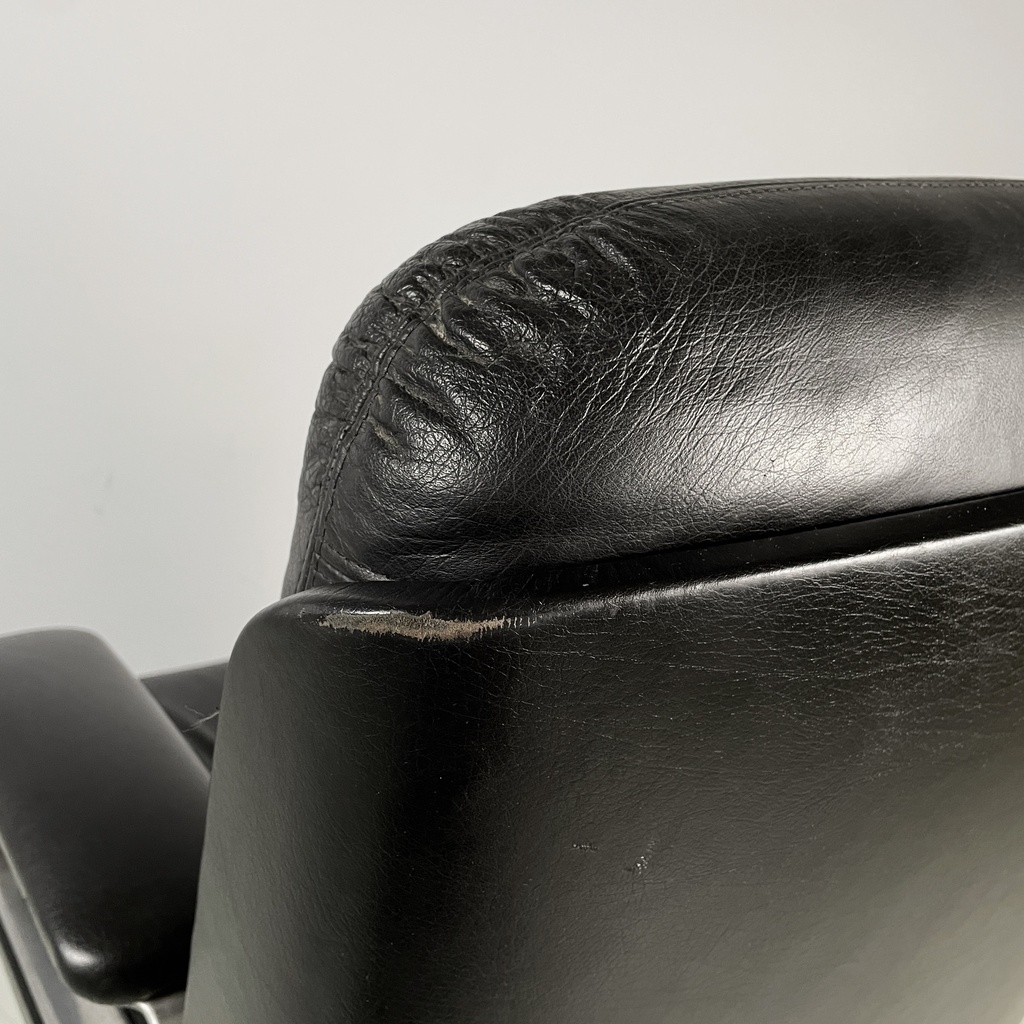 Poltrona da ufficio in pelle nera e metallo, 1980 ca.