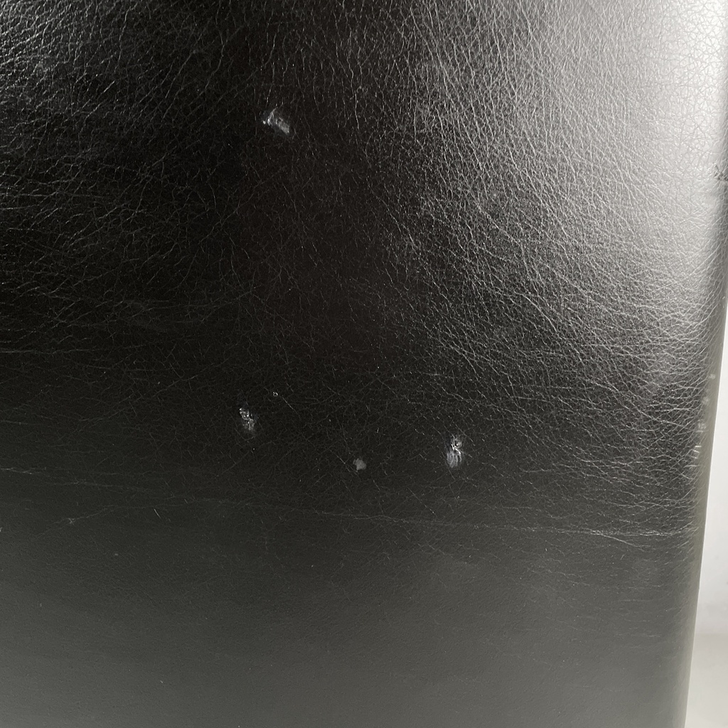 Poltrona da ufficio in pelle nera e metallo, 1980 ca.