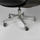 Poltrona da ufficio in pelle nera e metallo, 1980 ca.