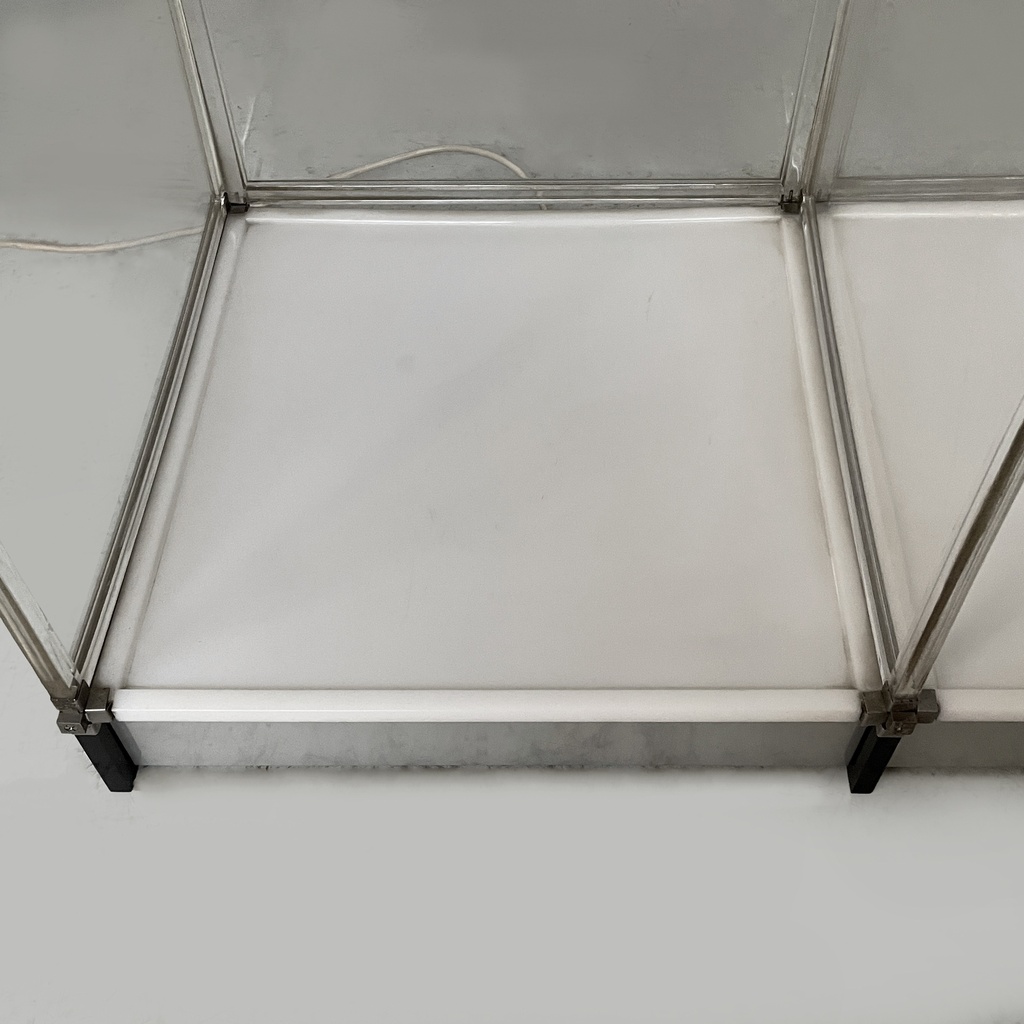 Libreria con lampada in plexiglass, 1970 ca.