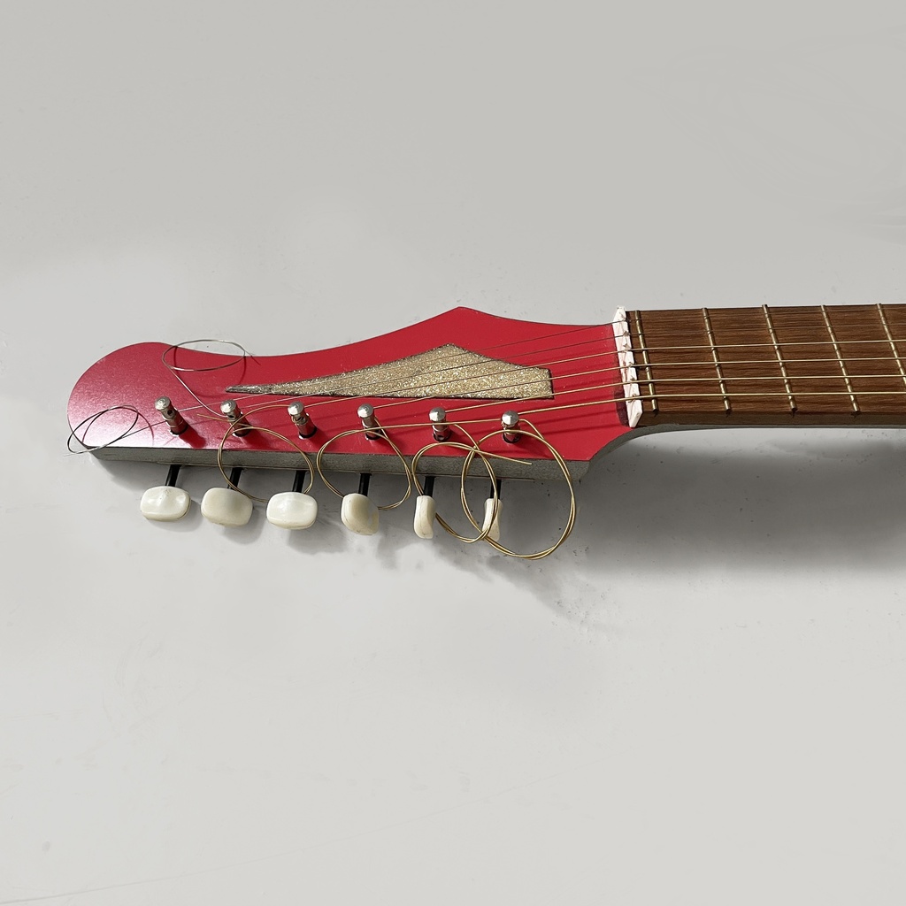 Chitarra elettrica giocattolo, 1980 ca.