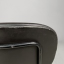 Sedia con braccioli in finta pelle nera, 1960 ca. 