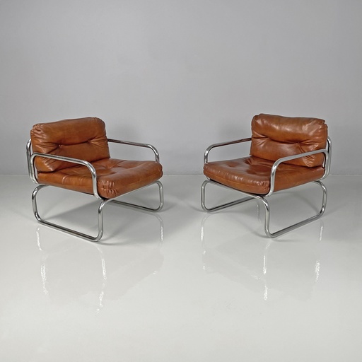 [2520005974] Poltrone in finta pelle marrone e metallo cromato, 1970 ca.