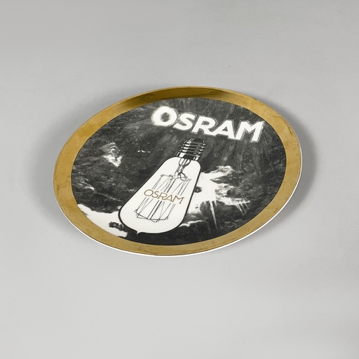 [2520006735] Piatto decorativo Osram di Fornasetti, 1970 ca.