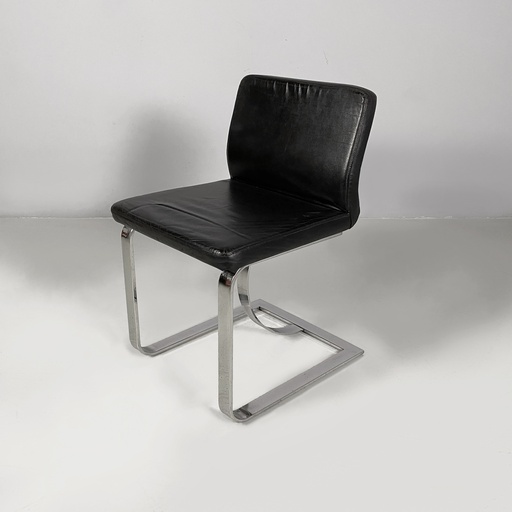 [2520006985] Sedia in pelle nera e acciaio, 1980 ca.