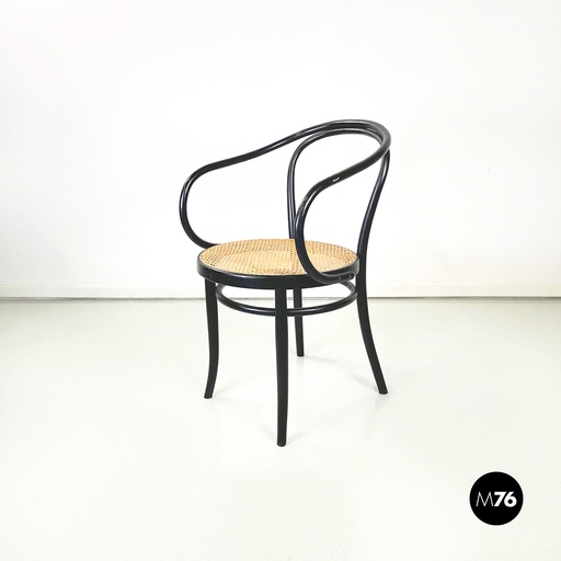 [2220002683] Sedia in legno nero e paglia di Vienna, 1930 ca.